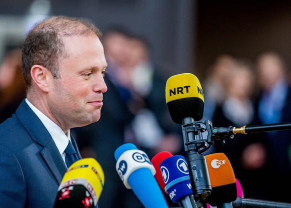 epa05838856 Malta's Prime Minister Joseph Muscat speaks to the media on his arrival at the European spring summit in Brussels, Belgium, 09 March 2017. European leaders will mainly focus on election of ...