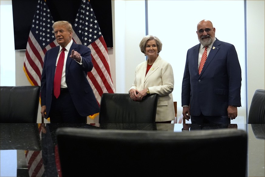 Republican presidential nominee former President Donald Trump meets with Ukraine&#039;s President Volodymyr Zelenskyy at Trump Tower, Friday, Sept. 27, 2024, in New York, as Susie Wiles and Chris LaCi ...