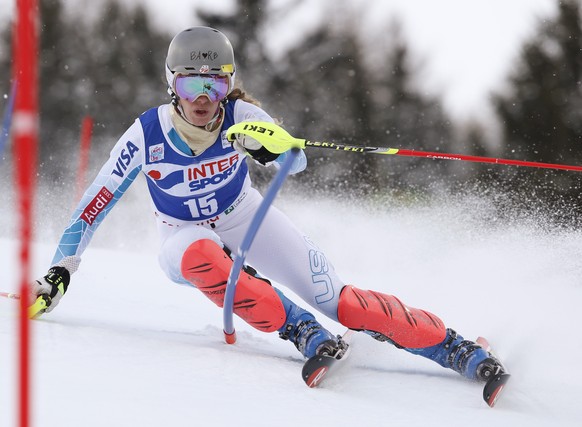 Resi Stiegler, of the United States, skies past a pole during the first run of an alpine ski, women's World Cup slalom, in Santa Caterina, Italy, Tuesday, Jan. 5, 2016. (AP Photo/Alessandro Trova ...