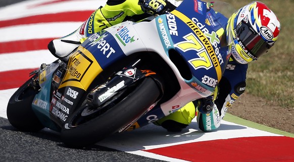 Switzerland's Dominique Aegerter steers his Kalex during the Moto 2 third free practice session for the motorcycle GP in Montmelo, Spain, Saturday, June 13, 2015. The Catalunya Grand Prix will take pl ...