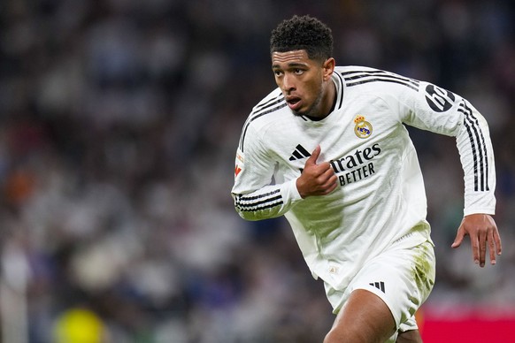 Real Madrid&#039;s Jude Bellingham runs during a Spanish La Liga soccer match between Real Madrid and Alaves at Santiago Bernabeu stadium in Madrid, Spain, Tuesday, Sept. 24, 2024. (AP Photo/Manu Fern ...