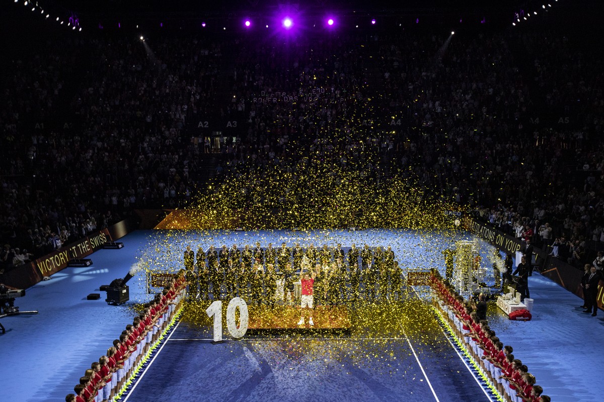 epa07954038 Roger Federer of Switzerland poses with his trophy after defeating Alex De Minaur of Australia after the final match at the Swiss Indoors tennis tournament at the St. Jakobshalle in Basel, ...