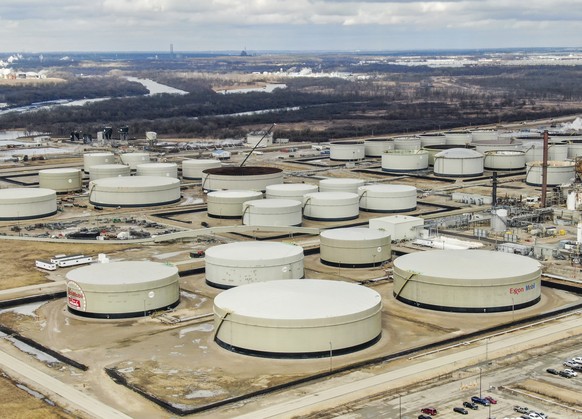 epa09808655 An aerial photo made with a drone shows the ExxonMobile refinery near Joliet, Illinois, USA, 07 March 2022. According to the White House, the US Department of Energy has approved the relea ...