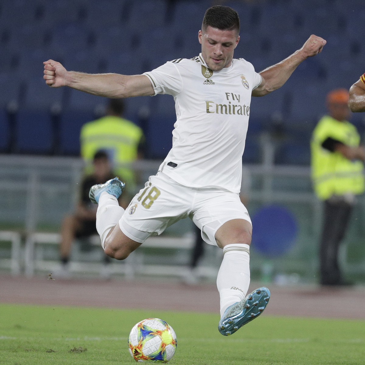 Real Madrid's Luka Jovic, left, is chased by Roma's Federico Fazio during a friendly soccer match between Roma and Real Madrid, at the Olympic stadium in Rome, Sunday, Aug. 11, 2019. (AP Pho ...