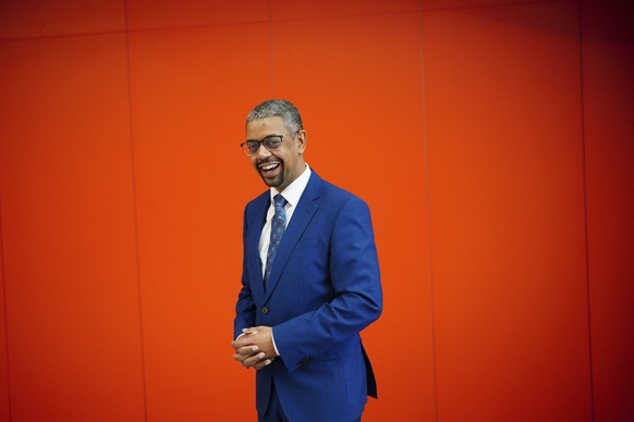 Vaughan Gething poses for a photo in a lecture hall at Cardiff University, after being elected the next Welsh Labor leader and First Minister of Wales, in Cardiff, Saturday, March 16, 2024. Gethi...