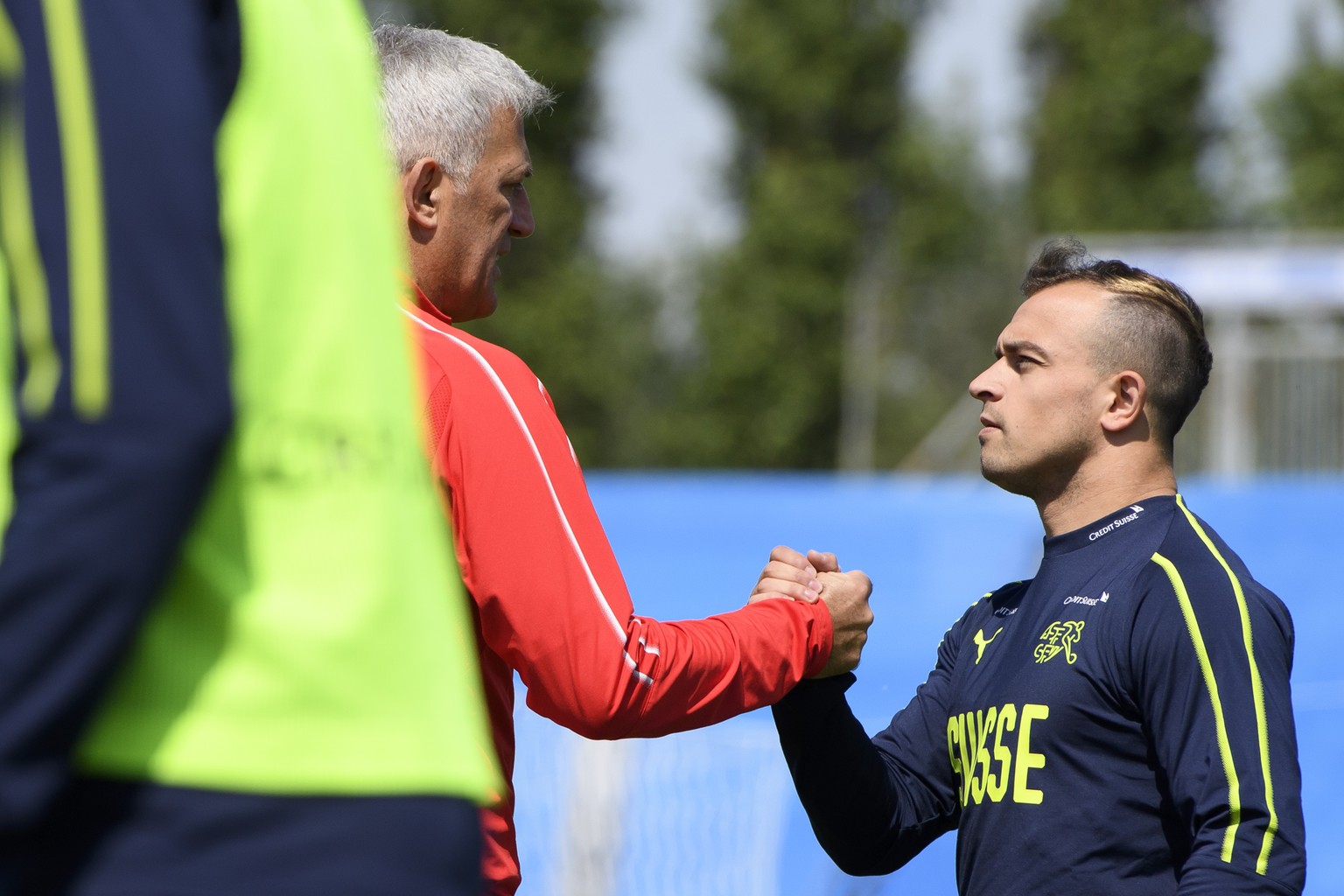 Switzerland&#039;s head coach Vladimir Petkovic, left, cheers with Switzerland&#039;s midfielder Xherdan Shaqiri, right, during a training session of the Switzerland&#039;s national soccer team at the ...