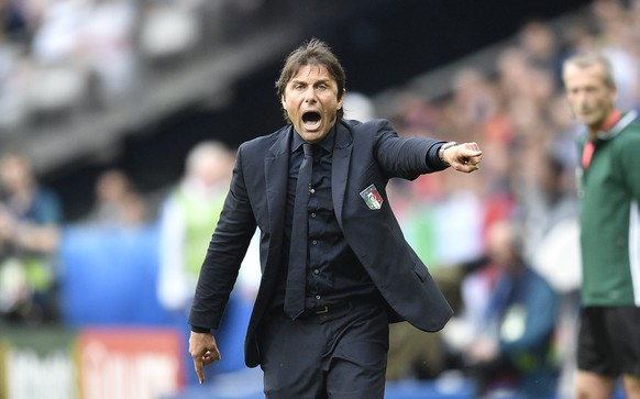 Italy coach Antonio Conte gestures during the Euro 2016 round of 16 soccer match between Italy and Spain, at the Stade de France, in Saint-Denis, north of Paris, Monday, June 27, 2016. (AP Photo/Marti ...