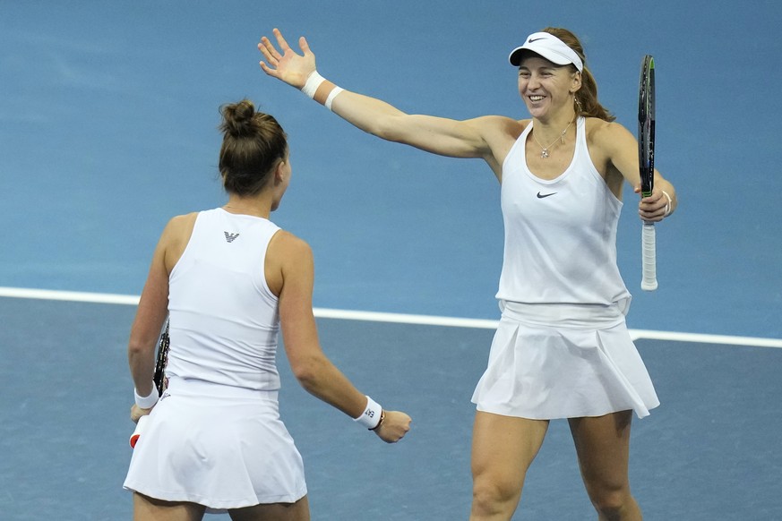Russia&#039;s Liudmila Samsonova, right, celebrates with Veronika Kudermetova after defeating US Coco Vandeweghe and Shelby Rogers in their Billie Jean King Cup semifinal tennis match in Prague, Czech ...