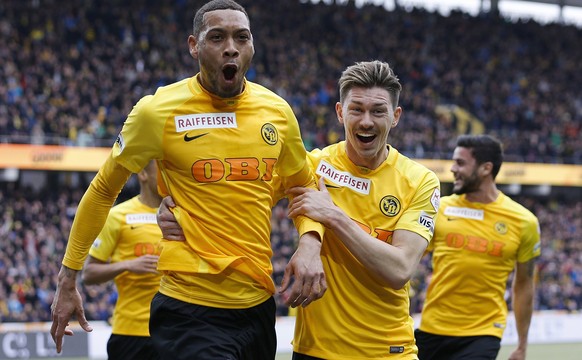 epa06641929 Bern&#039;s Guillaume Hoarau (L) celebrates with teammate Christian Fassnacht after scoring the 1-0 lead during the Super League match between BSC Young Boys Bern and FC Basel at the Stade ...