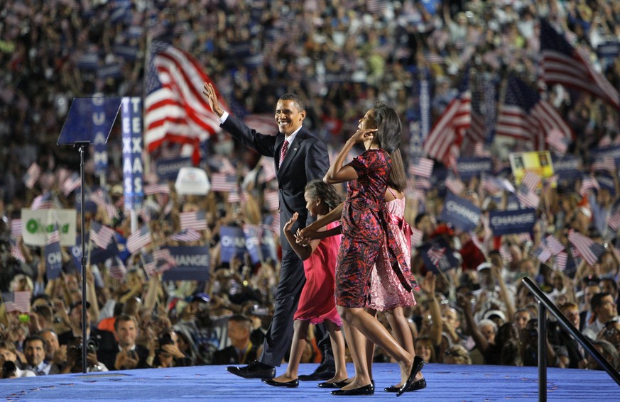 FILE - In this Aug. 28, 2008 , file photo Democratic presidential nominee, Sen. Barack Obama, D-Ill., left, his wife, Michelle, right, are joined by daughters Malia, right, and Sasha, after his nomina ...