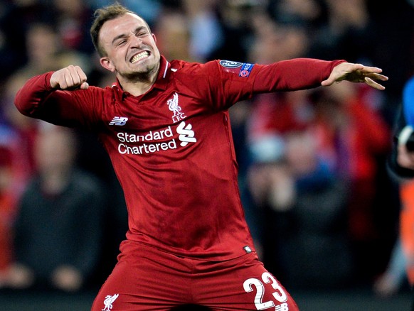 epa07554684 Liverpool&#039;s Xherdan Shaqiri reacts after winning the UEFA Champions League semi final second leg soccer match between Liverpool FC and FC Barcelona in Liverpool, Britain, 07 May 2019. ...