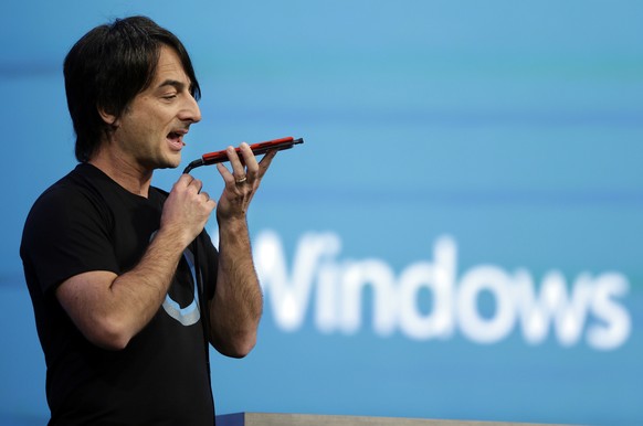 FILE - In this April 2, 2014 file photo, Microsoft corporate vice president Joe Belfiore, of the Operating Systems Group, demonstrates the new Cortana personal assistant during the keynote address of  ...