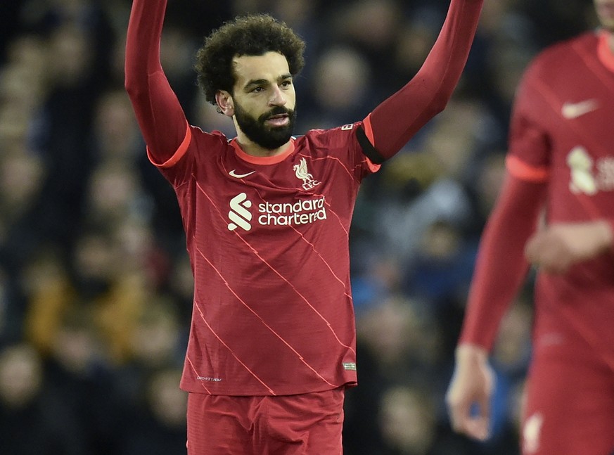 epa09615263 Mohamed Salah (L) of Liverpool celebrates after scoring the 2-0 lead during the English Premier League soccer match between Everton FC and Liverpool FC in Liverpool, Britain, 01 December 2 ...