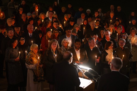 Speaker of the B.C. Legislative Assembly Raj Chouhan speaks at a candle light vigil at the front steps of the legislature in Victoria, B.C., on Wednesday, Feb. 11, 2026 in honor of the victims of the  ...