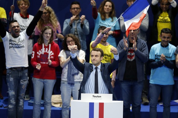 epa05802364 Emmanuel Macron, independent candidate for the 2017 French Presidential Elections, gestures after delivering a speech during an election campaign event in Toulon, France, 18 February 2017. ...