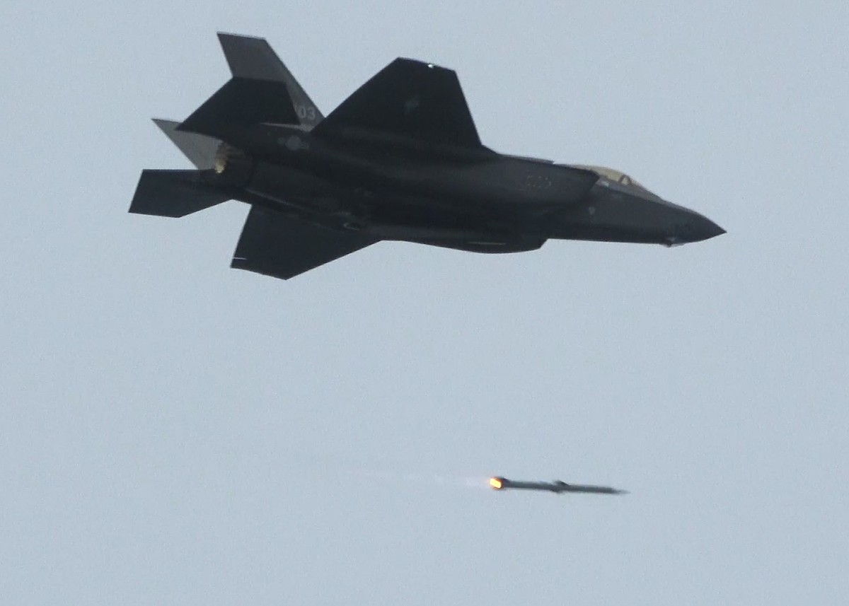 In this frame grab made from video released by South Korea Defense Ministry, an AIM-120 advanced medium-range air-to-air missile is fired from a South Korean Air Force's F-35A fighter jet during  ...