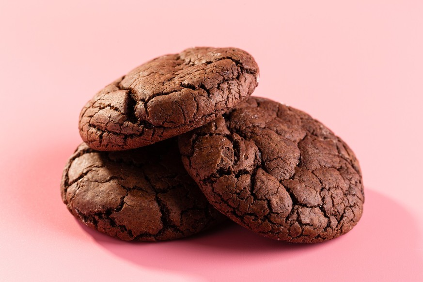 Homemade brownie cookies. Creative design minimal concept. Pop art still life on color background