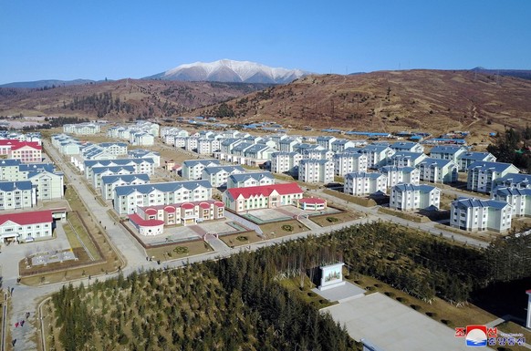 epa09584689 An undated photo released by the official North Korean Central News Agency (KCNA) shows the city of Samjiyon, Ryanggang Province, in North Korea (issued 16 November 2021). The city is the  ...