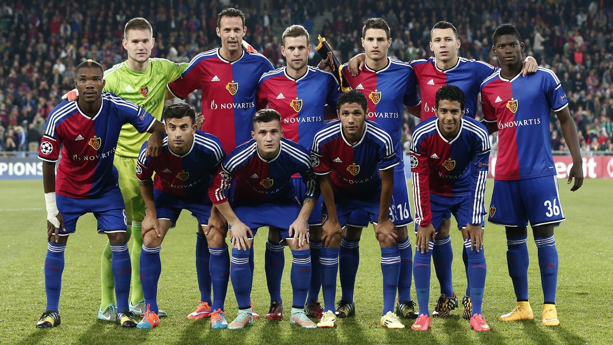 Basel's players pose prior to the UEFA Champions League group B matchday 2 soccer match between Switzerland's FC Basel 1893 and Britain's Liverpool FC in the St. Jakob-Park stadium in B ...