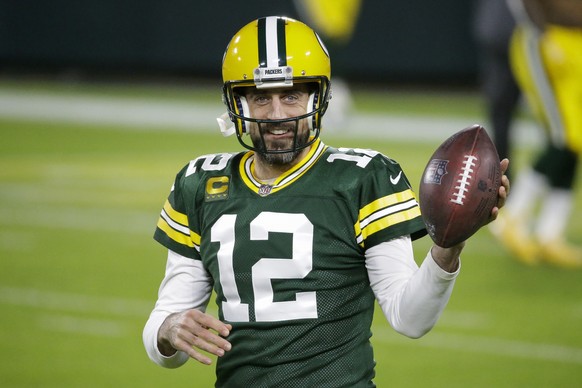 FILE - Green Bay Packers' Aaron Rodgers warms up before an NFL football game against the Chicago Bears in Green Bay, Wis., in this Sunday, Nov. 29, 2020, file photo. Shailene Woodley confirmed th ...