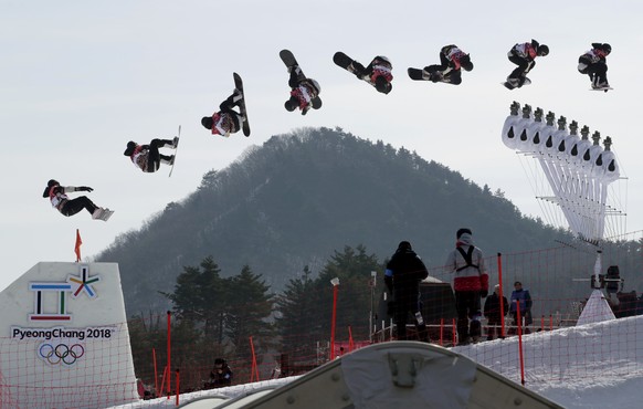 In this multiple exposure image Laurie Blouin, of Canada, jumps during qualification for the women&#039;s Big Air snowboard competition at the 2018 Winter Olympics in Pyeongchang, South Korea, Monday, ...