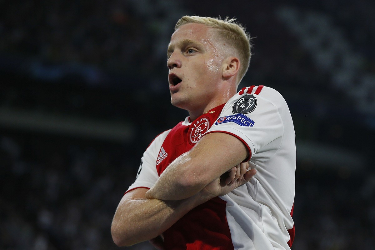 Ajax's Donny van de Beek celebrates scoring his side's second goal during a Group E Champions League soccer match between Ajax and AEK at the Johan Cruyff ArenA in Amsterdam, Netherlands, We ...