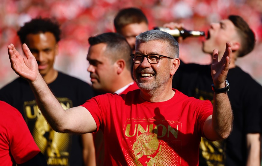 epa10657816 Union?s head coach Urs Fischer celebrates qualifying for Champions League after the German Bundesliga soccer match between Union Berlin and SV Werder Bremen in Berlin, Germany, 27 May 2023 ...