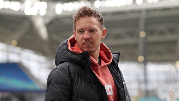 epa09073818 Julian Nagelsmann, Head Coach of RB Leipzig looks on prior to the Bundesliga match between RB Leipzig and Eintracht Frankfurt at Red Bull Arena in Leipzig, Germany, 14 March 2021. EPA/BORI ...