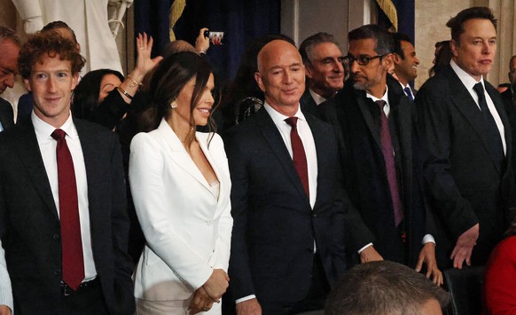 epa11840557 (L-R) Priscilla Chan, Meta founder Mark Zuckerberg, Lauren Sanchez, Amazon founder Jeff Bezos, Google CEO Sundar Pichai and Tesla CEO Elon Musk attend the inauguration of U.S. President-el ...