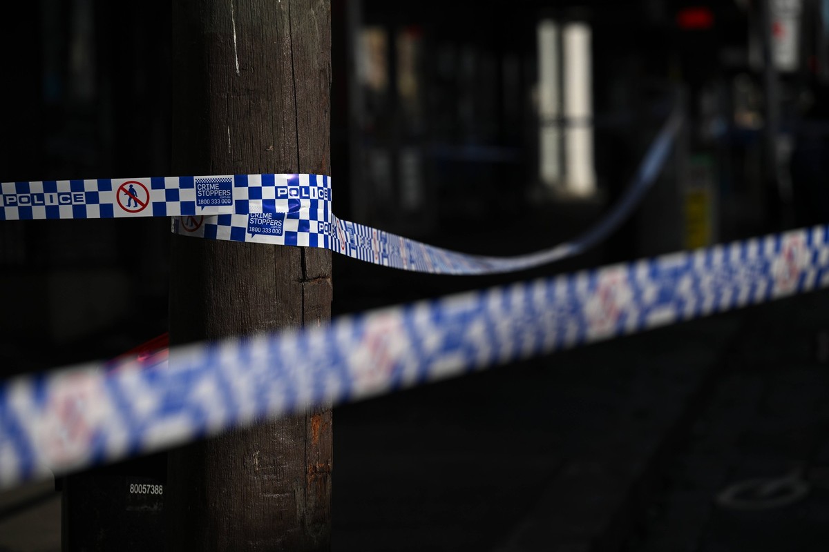 FIRE BOMBING MELBOURNE, Victoria Police and Forensic officers are seen at work within a crime scene where a building was destroyed in a suspected fire bombing last night in Richmond, Melbourne, Wednes ...
