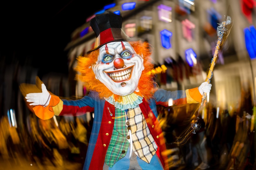 epaselect epa11940685 Masked brass and percussion carnival bands parade through the streets during the Monstercorso, the grand finale of the carnival, on Shrove Tuesday in Lucerne, Switzerland, 04 Mar ...