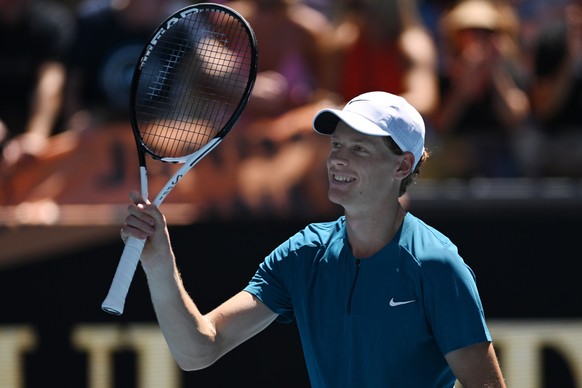 epa10416938 Jannik Sinner of Italy celebrates his third round win against Marton Fucsovics of Hungary during their third round match at the 2023 Australian Open tennis tournament at Melbourne Park in  ...