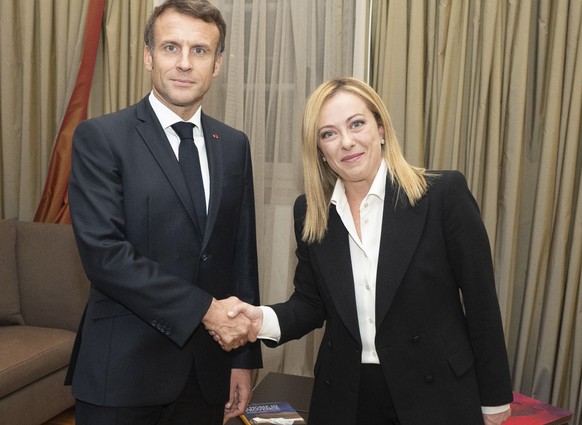 epa10261654 A handout photo made available by Chigi palace shows Italian Premier Giorgia Meloni meets French President Emmanuel Macron, Rome, Italy, 23 October 2022. EPA/FILIPPO ATTILI / CHIGI PALACE  ...