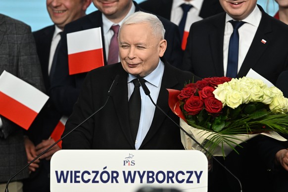 epa11264665 Leader of the main opposition party Law and Justice (PiS) Jaroslaw Kaczynski (C) speaks after the announcement of preliminary results of local elections at the PiS&#039;s headquarters in W ...