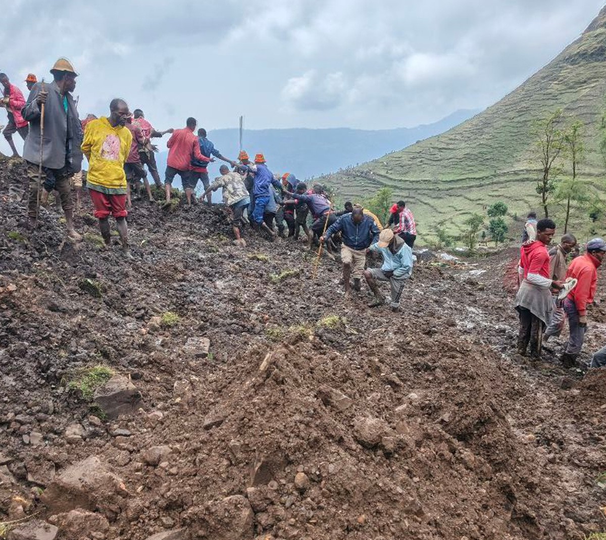 Locals search for the bodies of mudslide victims in the Gacho Baba district of the Gamo Zone in southern Ethiopia on Tuesday, March 10, 2026. (Gacho Baba District Government Communication Affairs Depa ...