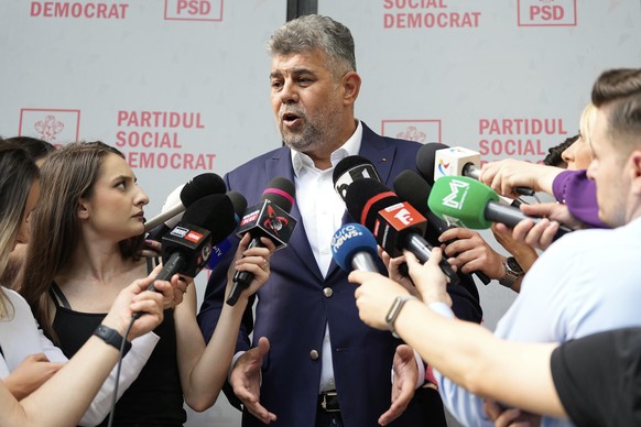 Romanian Prime Minister Marcel Ciolacu speaks to media at the PSD headquarters, in Bucharest, Romania, Monday, May 5, 2025, the day after the governing coalition&#039;s candidate failed to advance to  ...