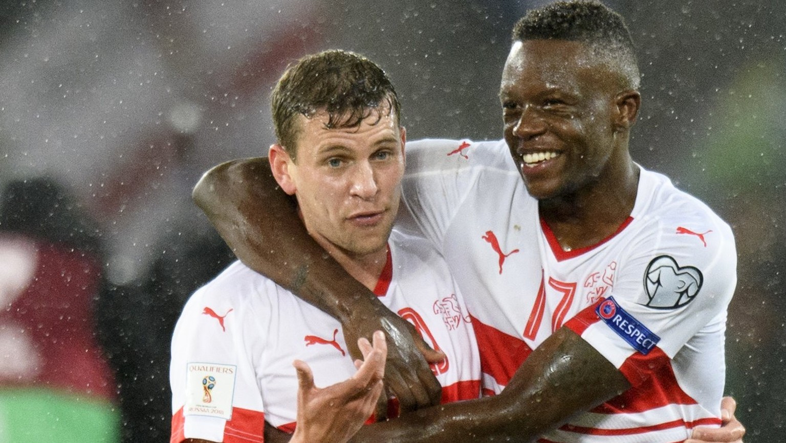 epa06319160 Switzerland&#039;s players Fabian Frei, left, and Denis Zakaria, right, celebrate after winning the 2018 Fifa World Cup play-offs first leg soccer match Northern Ireland against Switzerlan ...