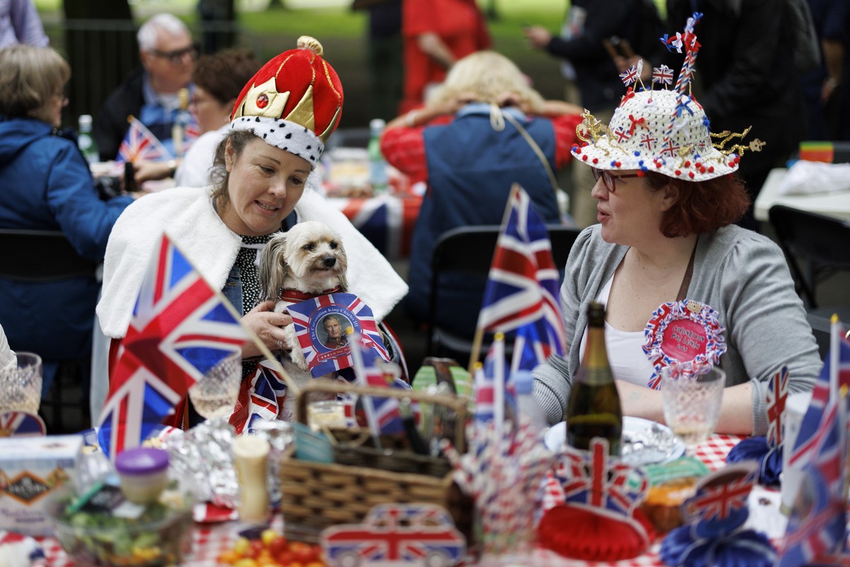 epa10613770 People join a street party to celebrate the Coronation of Britain's King Charles III in Regent's Park, London, Britain, 07 May 2023. Members of the public join Coronation street  ...