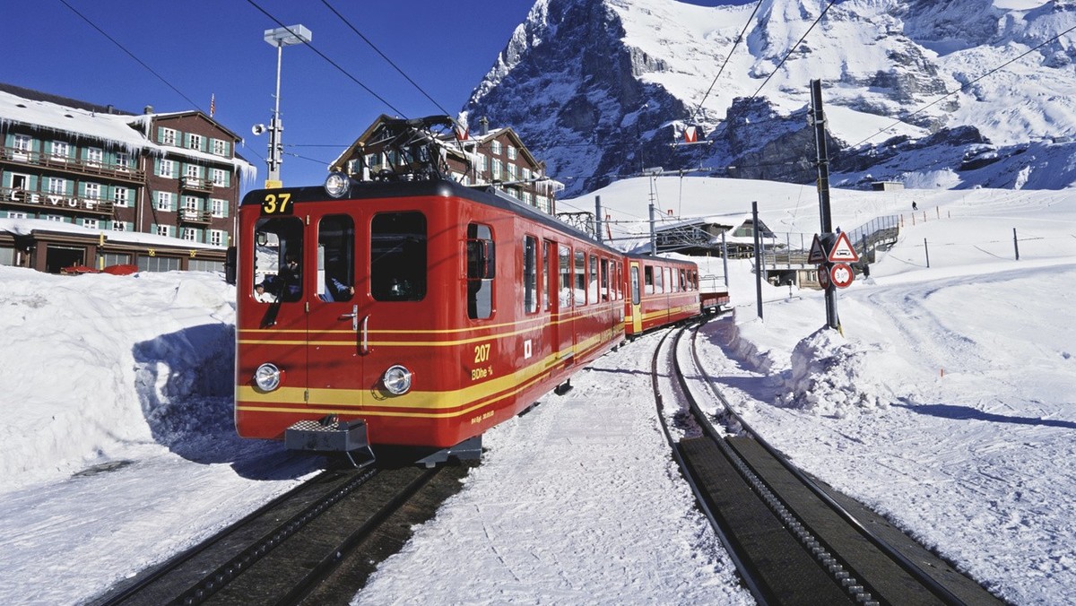 A train of the Jungfraubahn railway departs from the station on the Kleine Scheidegg to go back to Wengen in the Bernese Oberland, Switzerland, pictured on March 2, 2005. The Eiger mountain with the E ...