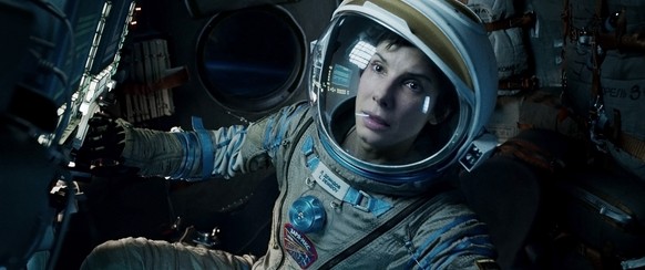 This film image released by Warner Bros. Pictures shows Sandra Bullock in a scene from &quot;Gravity.&quot; With the tightest three-way Oscar race in years, the 66th Directors Guild of America Awards  ...