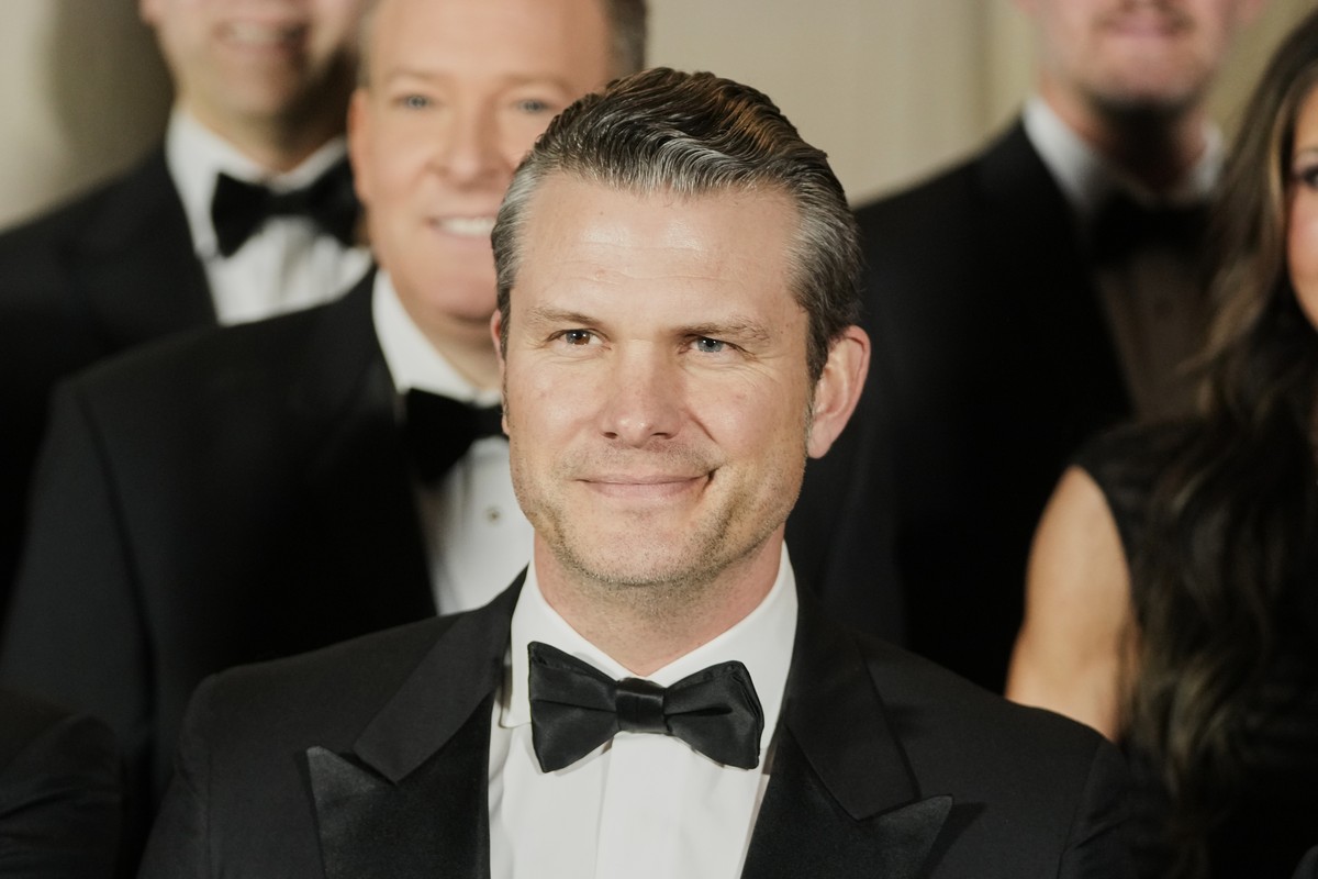 Pete Hegseth, President-elect Donald Trump's choice to be Defense Secretary, poses for a photo with Cabinet picks, other nominees and appointments, at the National Gallery of Art in Washington, S ...