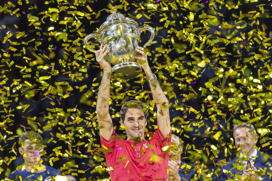 Switzerland&#039;s Roger Federer cheers after winning his tenth title at the Swiss Indoors tennis tournament at the St. Jakobshalle in Basel, Switzerland, on Sunday October 27, 2019. (KEYSTONE/Georgio ...