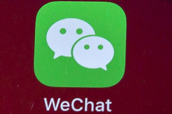 FILE - Icon for the smartphone app WeChat is seen on a smartphone screen in Beijing on Aug. 7, 2020. Australian Prime Minister Scott Morrison���s account on Chinese-owned social media platform WeChat  ...