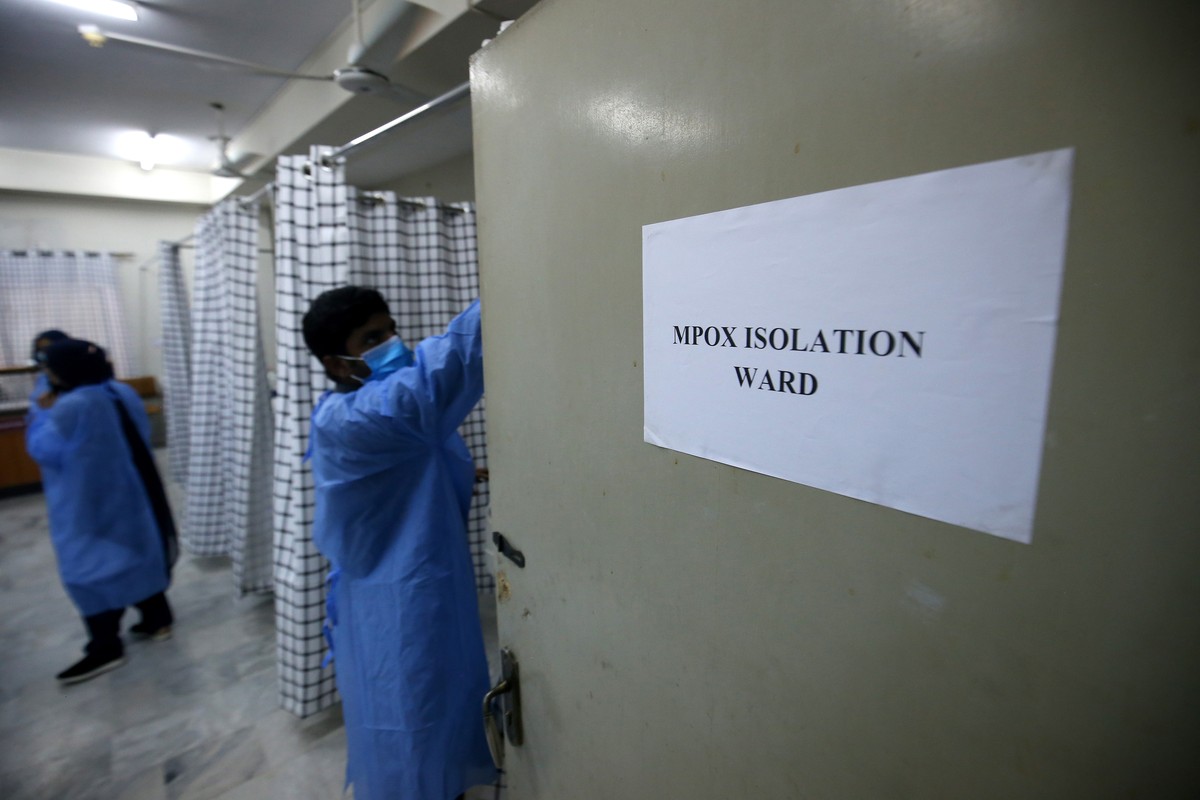 epa11556400 Hospital staff works at a ward at the Police &amp; Services Hospital, which has been converted to be used as an isolation ward for MPOX patients, in Peshawar, the provincial capital of KPK ...