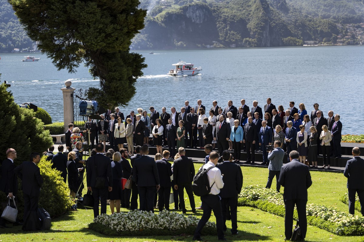 epa10052920 Participants stand for the closing family photo during the Ukraine Recovery Conference URC, in Lugano, Switzerland, 05 July 2022. The URC is organized to initiate the political process for ...
