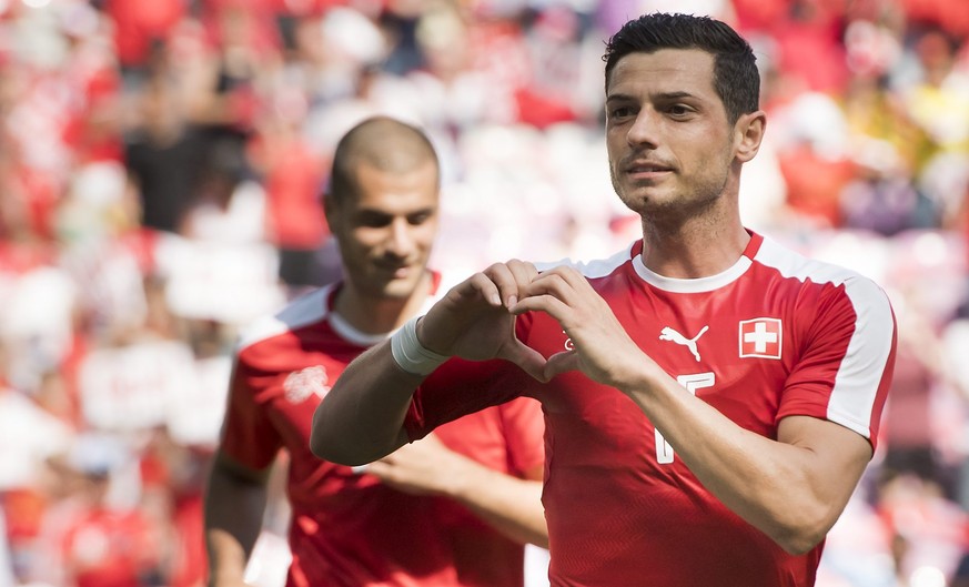 epa05333862 Switzerland&#039;s Blerim Dzemaili, celebrates after scoring a goal during an international friendly soccer match between Switzerland and Belgium, at the stade de Geneve stadium, in Geneva ...