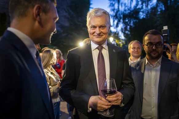 Lithuania&#039;s President Gitanas Nauseda, a presidential candidate, celebrates winning the second round of Lithuania&#039;s presidential election, in Vilnius, Lithuania, late Sunday, May 26, 2024. ( ...