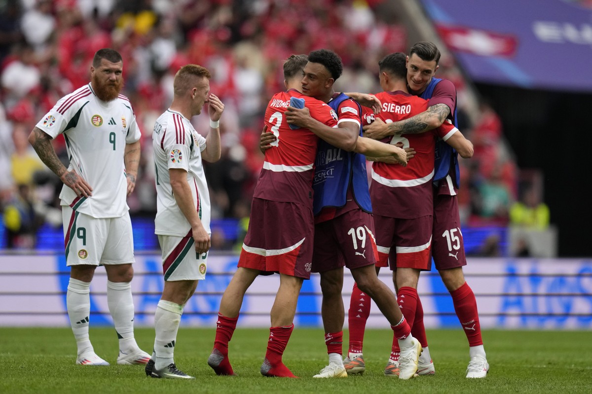 Switzerland's players celebrate after winner a Group A match between Hungary and Switzerland at the Euro 2024 soccer tournament in Cologne, Germany, Saturday, June 15, 2024. Switzerland won 3-1.  ...