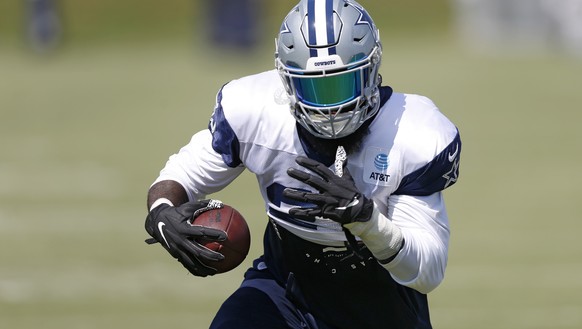 Dallas Cowboys NFL football running back Ezekiel Elliott practices in Frisco, Texas, Wednesday, Sept. 4, 2019. The star running back and the club agreed Wednesday on a $90 million, six-year contract e ...