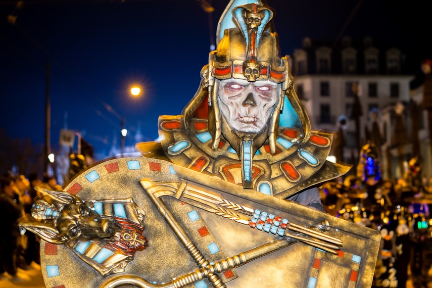 epa11940732 Masked brass and percussion carnival bands parade through the streets during the Monstercorso, the grand finale of the carnival, on Shrove Tuesday in Lucerne, Switzerland, 04 March 2025. E ...